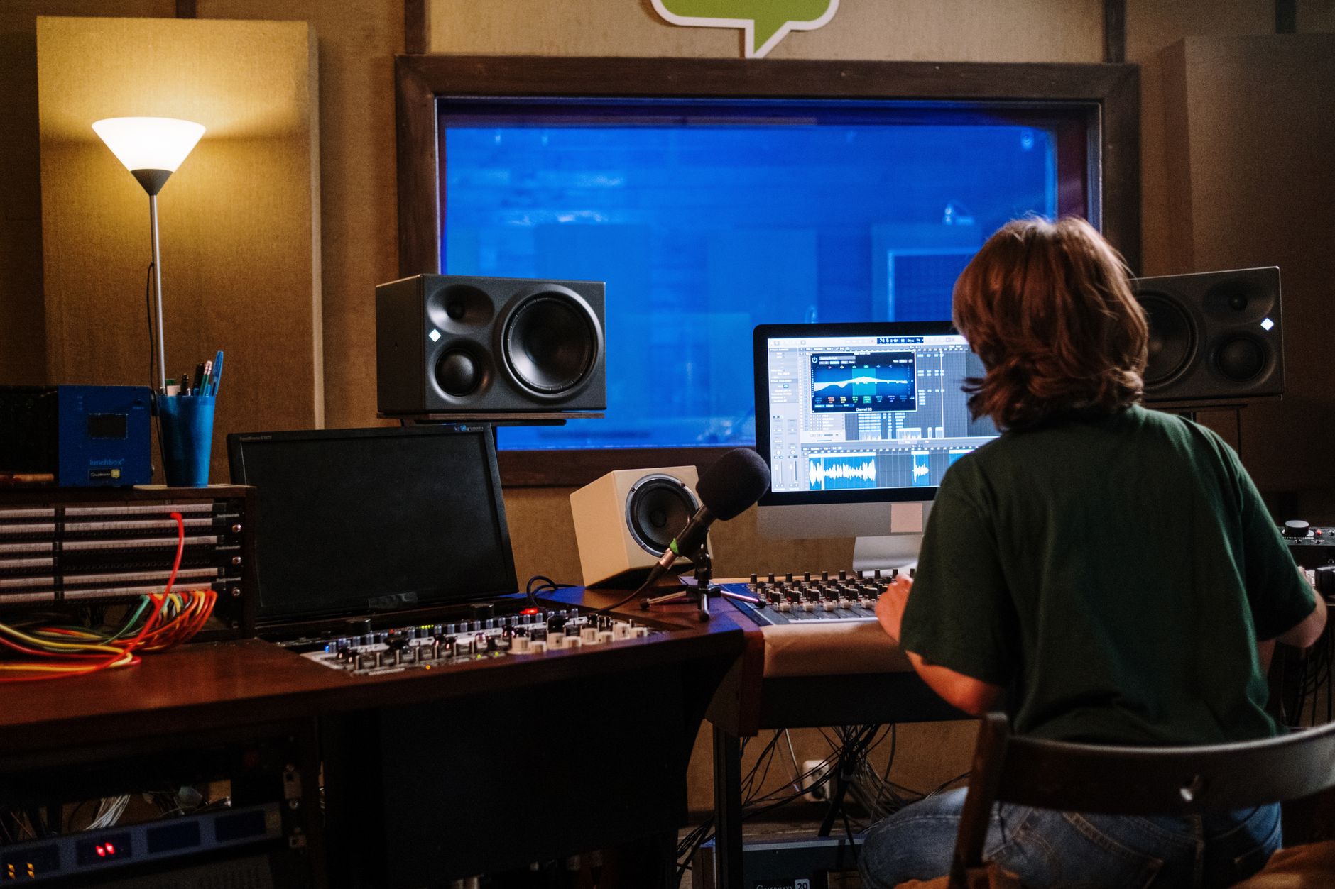 studio monitors compared side by side on mixing desk