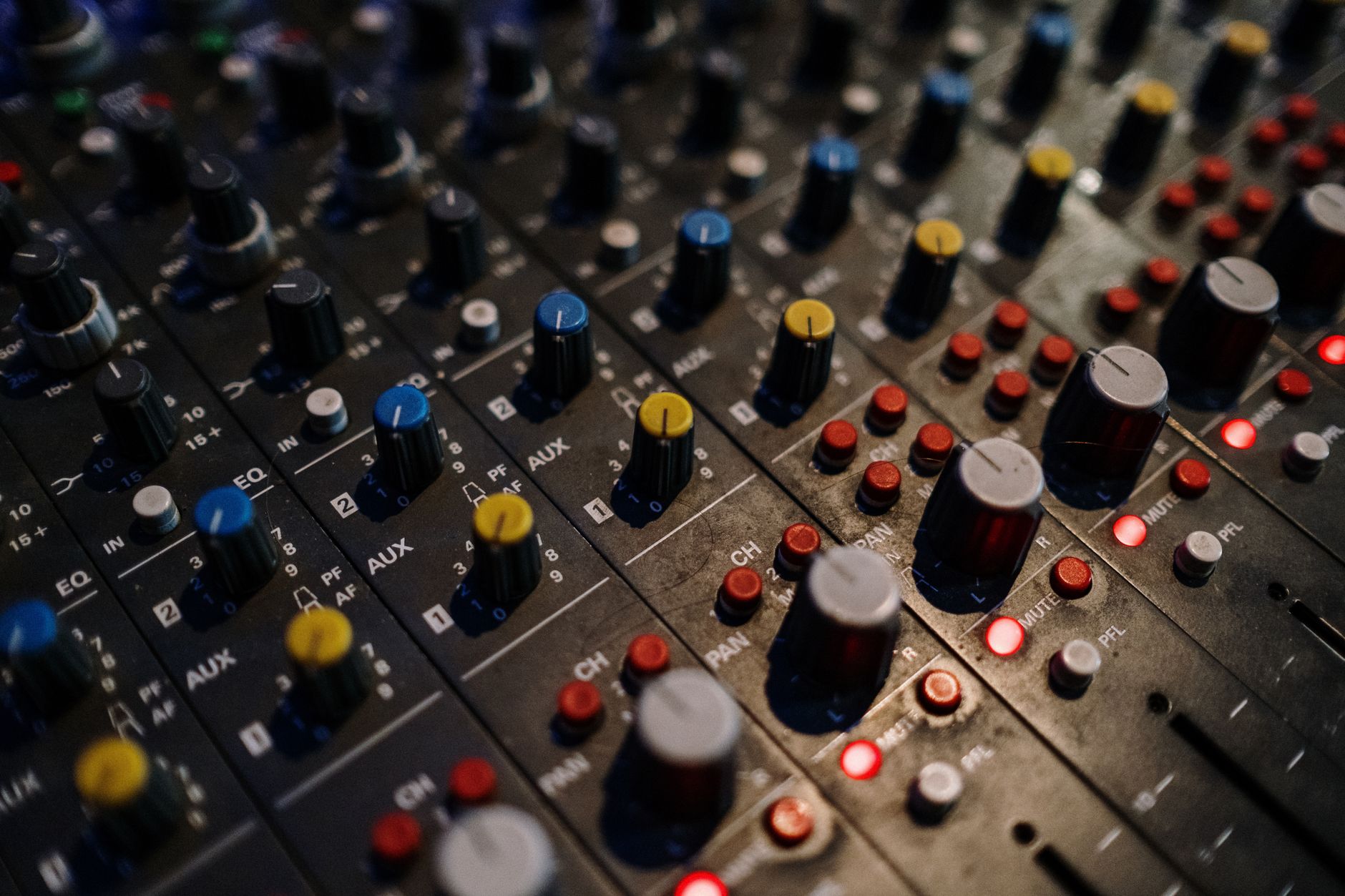 studio headphones on mixing console close-up