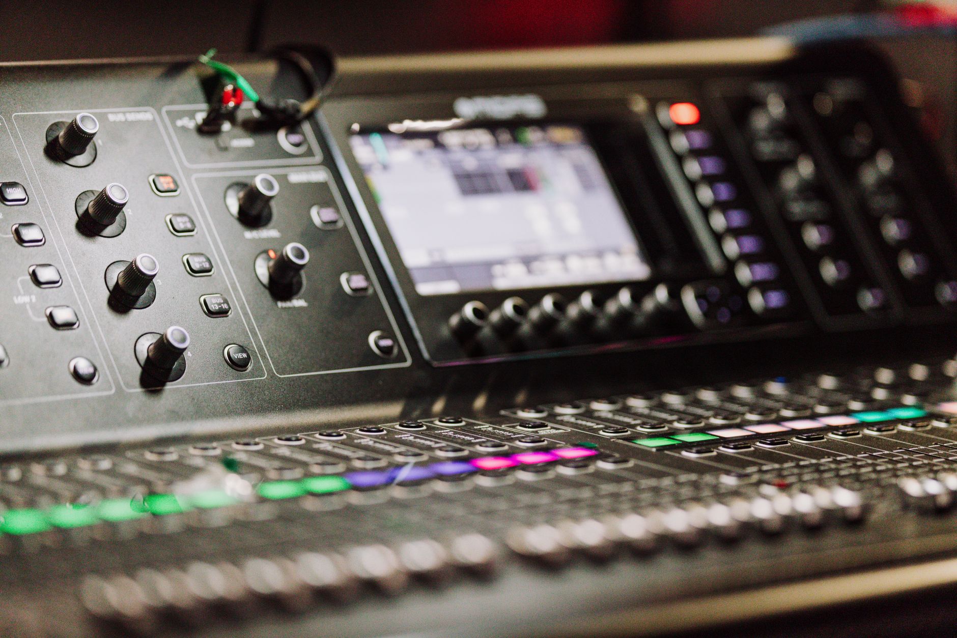 closed-back studio headphones on mixing desk