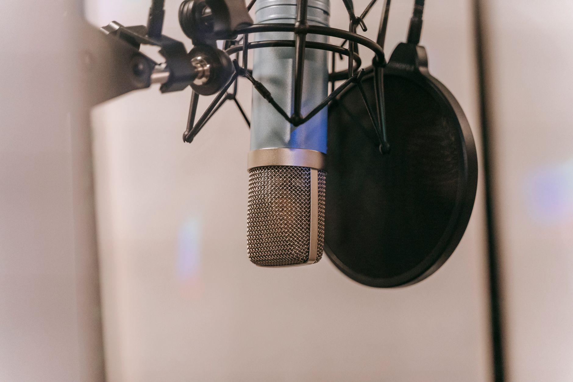 condenser microphone on desk home studio setup