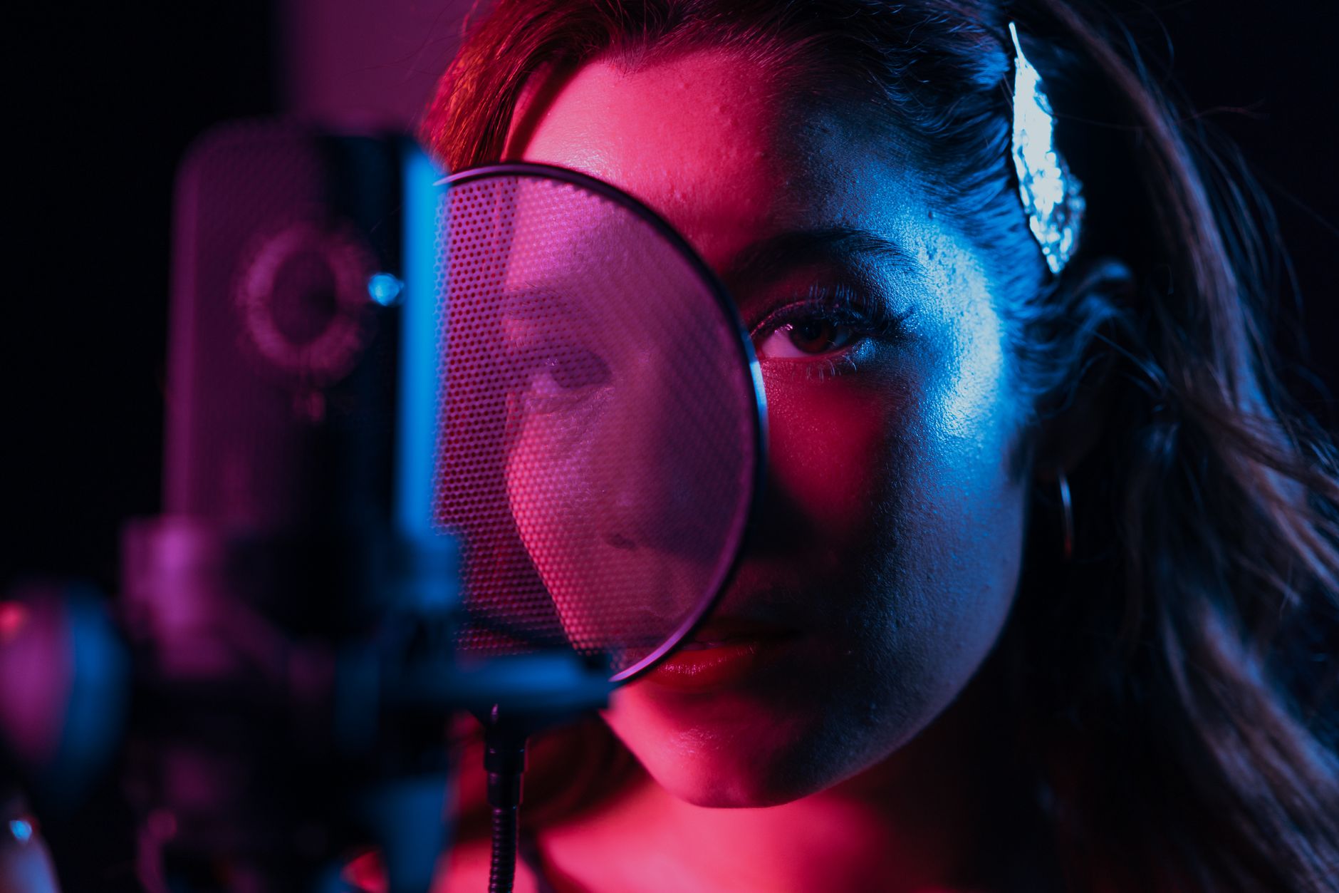 condenser microphone on desk pop filter studio