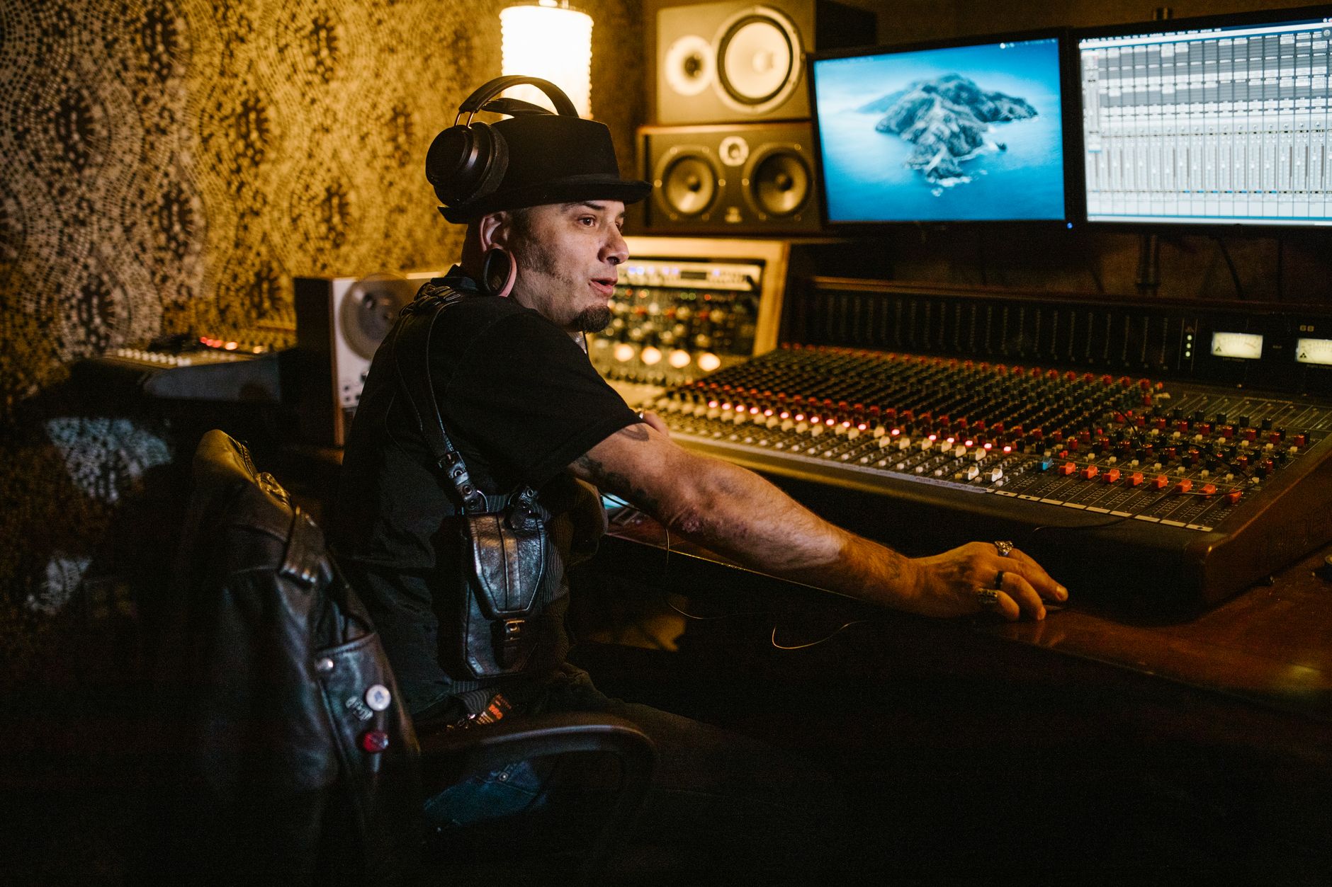 studio headphones on mixing desk open-back
