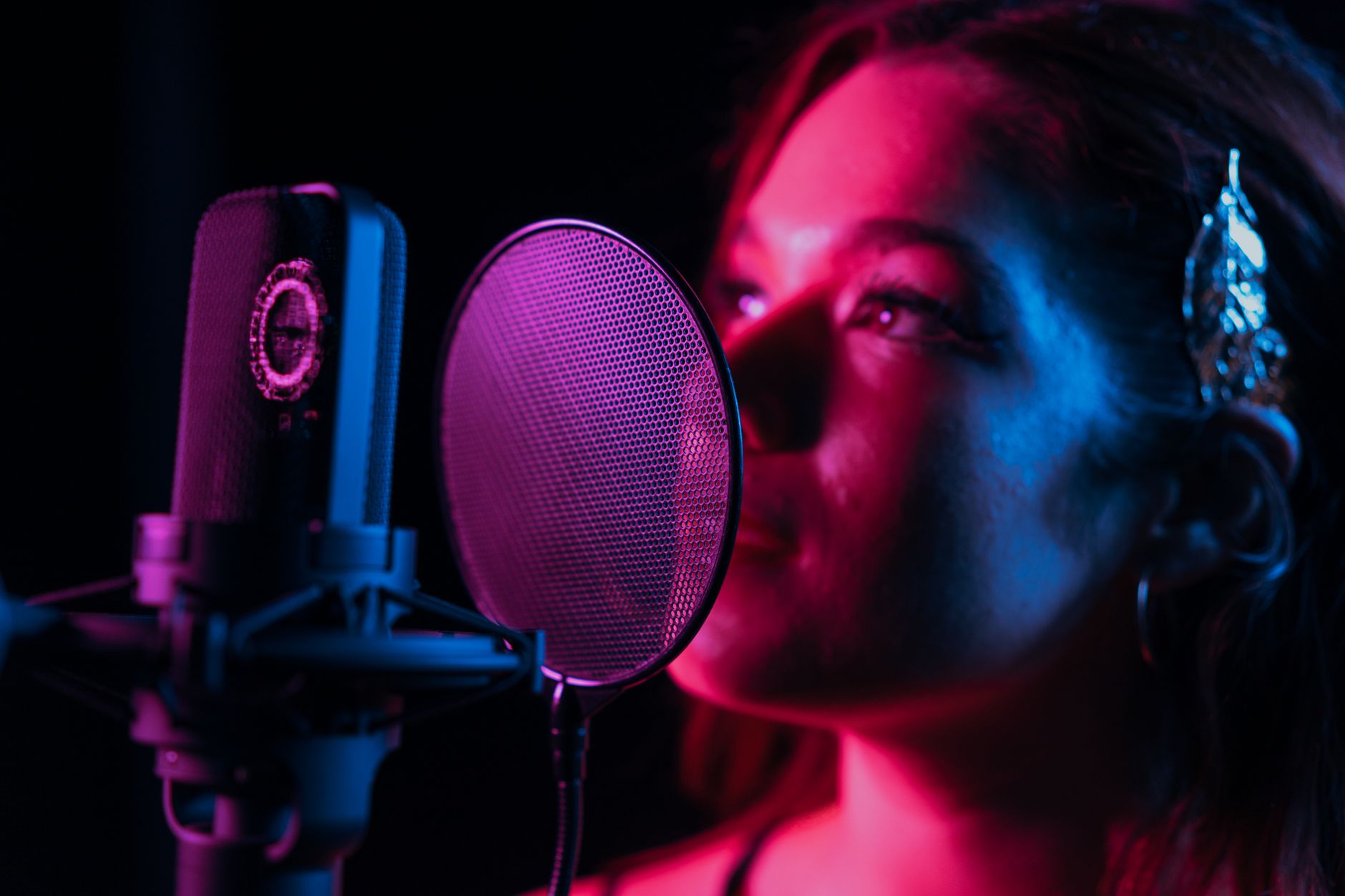 condenser microphone on stand with pop filter studio