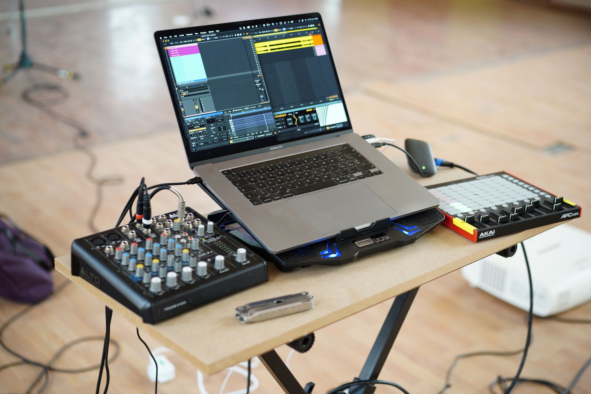 budget home studio desk setup with interface and headphones