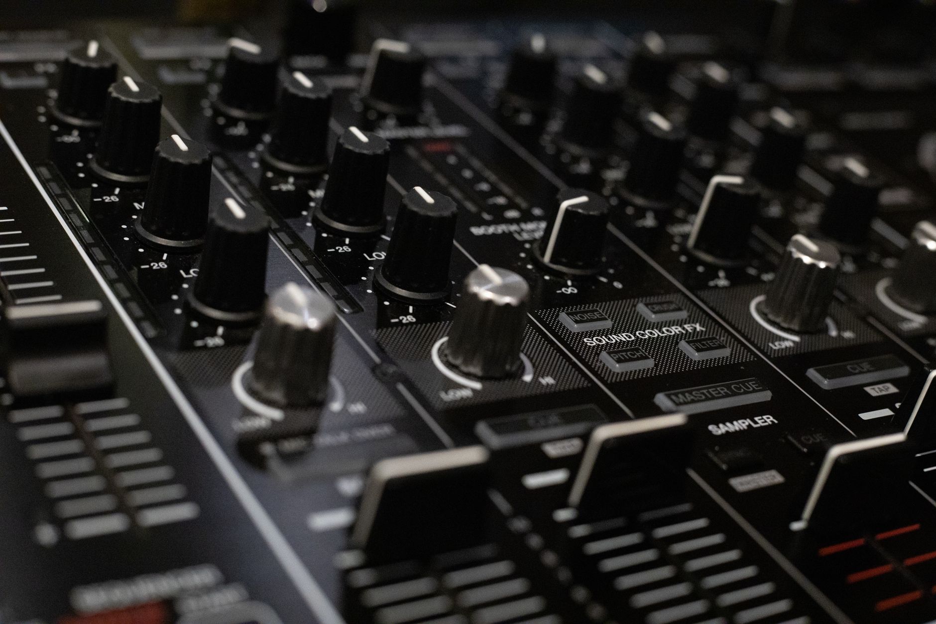 stereo panning knobs on mixing console close-up